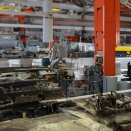 Male Engineer Working On Machine