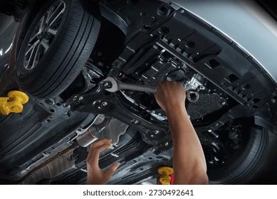 Mechanic Repairing Car Undercarriage Wrench 260nw 2730492641